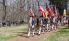 Georgia Color Guard marching to monument.